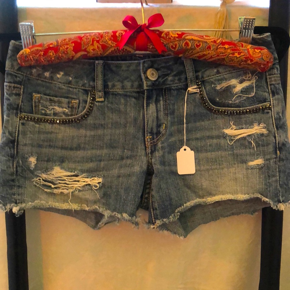 American Eagle Size 4 Jean Short Distressed Faded Wash with Rhinestoned Pockets